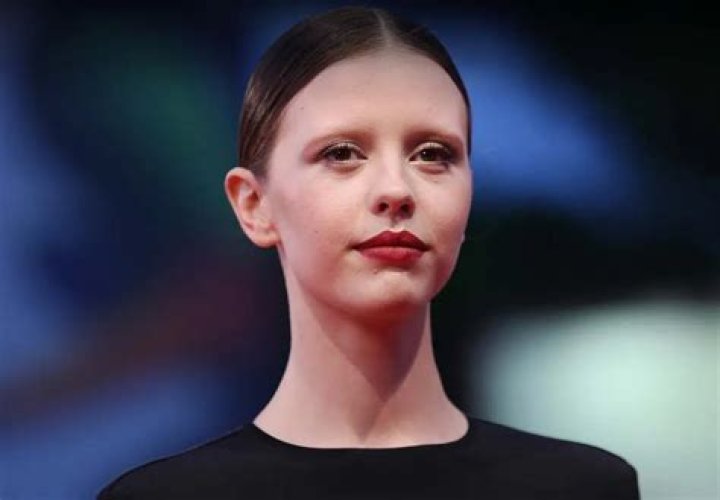 Is Mia Goth hot despite having no eyebrows or precisely because of it?